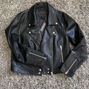 Brand new, never worn, black faux leather jacket.